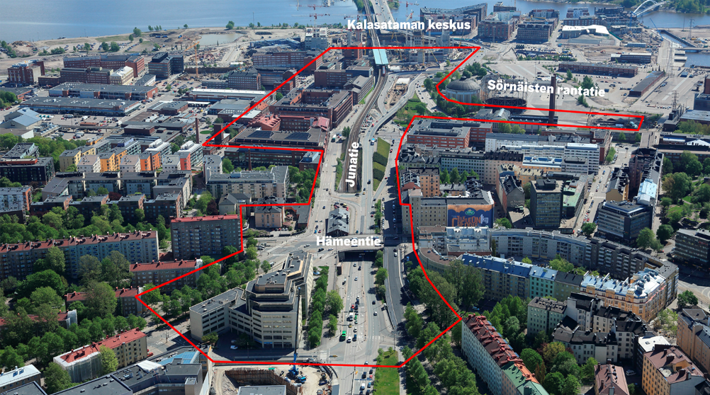 Junatien alue luoteen suunnasta nähtynä. Edessä Hämeentien silta, takana Kalastama ja Redin työmaa.